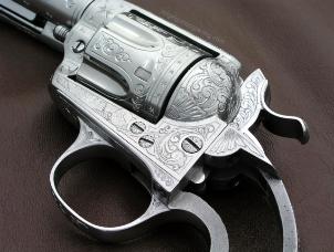 Engraved Colt Bisley model 38 LC 1912 left frame, by reigelgunengraving.com